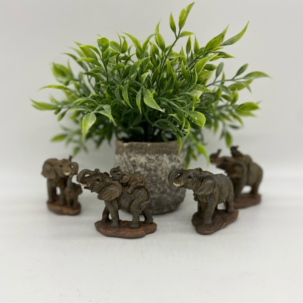 Elephant figurines set of four